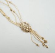 A modern Italian 375 yellow metal multi strand drop tassel necklace, approx. 49cm, 9.9 grams.