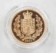 An Elizabeth II 2002 gold sovereign, in case.