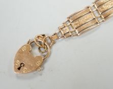 A 15ct gate link bracelet, with heart shaped padlock clasp, 19.5cm, 27.8 grams.