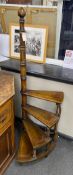 A set of reproduction mahogany four tread library steps, height 153cm