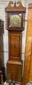A late 18th century country oak and mahogany crossbanded longcase clock, the 11in. square brass dial
