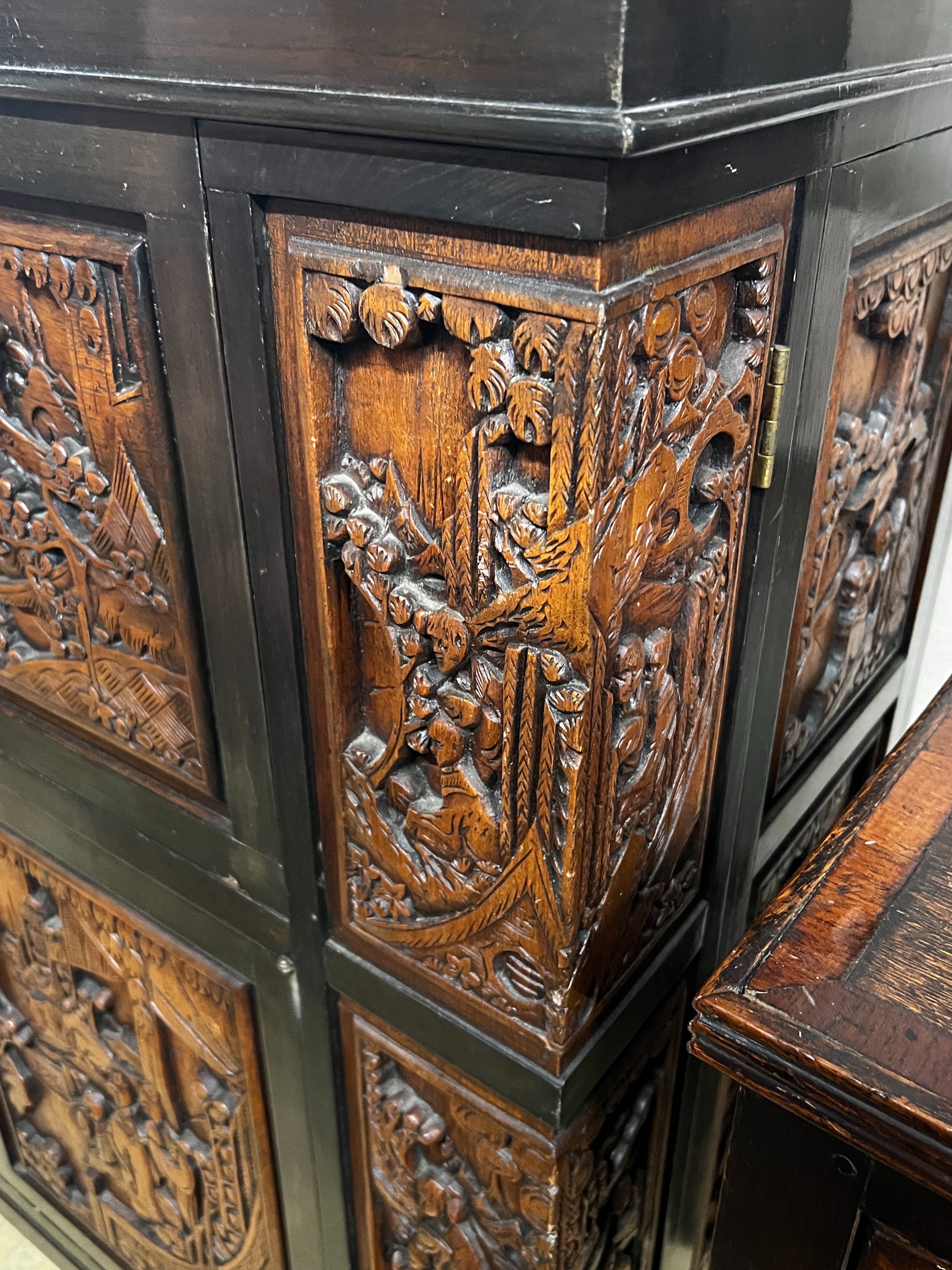 A Chinese carved hinged top cocktail cabinet with mirrored interior, width 111cm, depth 46cm, height - Image 4 of 9