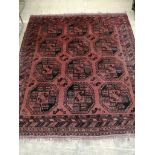 An Bokhara red ground rug, 180 x 156cm