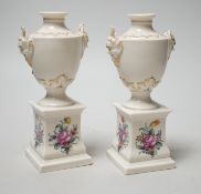 A pair of Nymphenburg urns, marked to base. 15.5cm tall