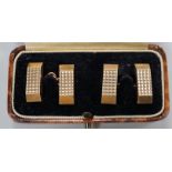 A pair of 9ct gold shaped rectangular cuff links, 19mm, 18.9 grams.