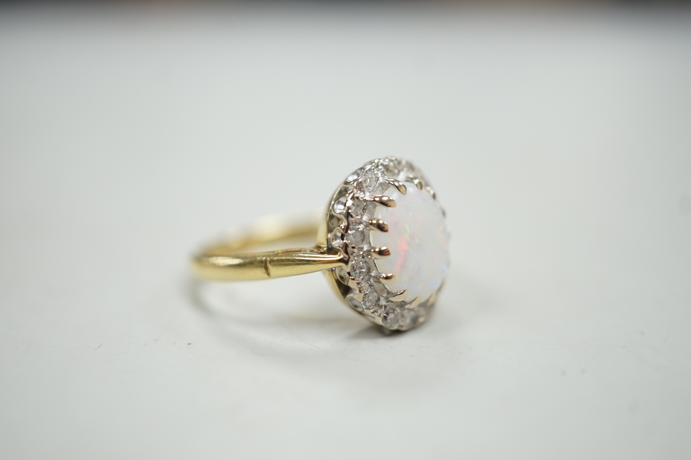 A modern 18ct white gold white opal and diamond set oval cluster ring, size M, gross weight 4.3 - Image 3 of 4