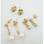 Two modern pairs of 18ct gold, emerald and diamond set ear studs and a pair of 18ct gold, cultured