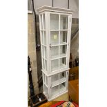 A white painted display cabinet, width 73cm, depth 39cm, height 230cm