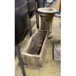 A Doulton Victorian earthenware water filter section, height 46cm together with a stone garden
