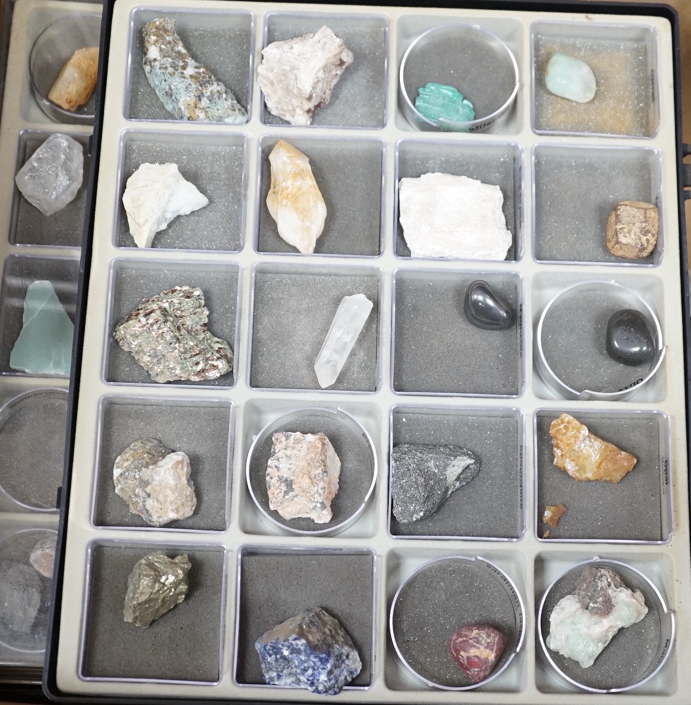 A group of assorted mineral and fossil specimens