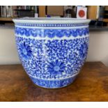 A 20th century Chinese blue and white jardiniere, diameter 42cm, height 38cm