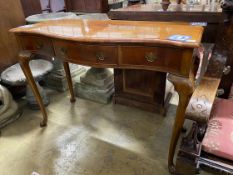 A reproduction Queen Anne revival walnut serpentine serving table, width 122cm, depth 53cm, height