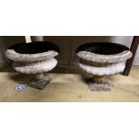A pair of circular reconstituted stone campana garden urns, diameter 48cm, height 37cm