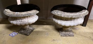 A pair of circular reconstituted stone campana garden urns, diameter 48cm, height 37cm
