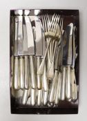 A set of twelve Elizabeth II silver handled dessert knives and twelve table knives, FB, Sheffield,