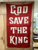 A George V printed cotton coronation banner “God Save The King”, width 98cm, height 178cm.