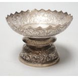 A Chinese Straits embossed white metal stem bowl, diameter 13cm, 172 grams.