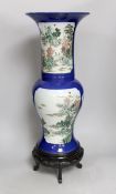 A Chinese famille verte powder blue yen-yen vase, on wooden stand, 58cms high, including stand