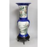 A Chinese famille verte powder blue yen-yen vase, on wooden stand, 58cms high, including stand