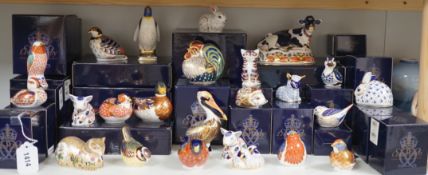 Approximately thirty-two Royal Crown Derby Imari porcelain paperweights, all but two with original