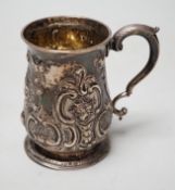 A George III silver small mug, with later embossed decoration, William Cripps, London, 1775, 95mm,