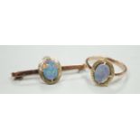 A 9ct and black opal doublet set bar brooch, 38mm and a matching ring, size R, gross weight 5.9