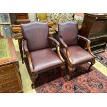 A pair of reproduction mahogany Gainsborough style library chairs, width 68cm, depth 70cm, height