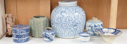 A group of 19th century blue and white jars, a stacking food box and two bowls, together with a