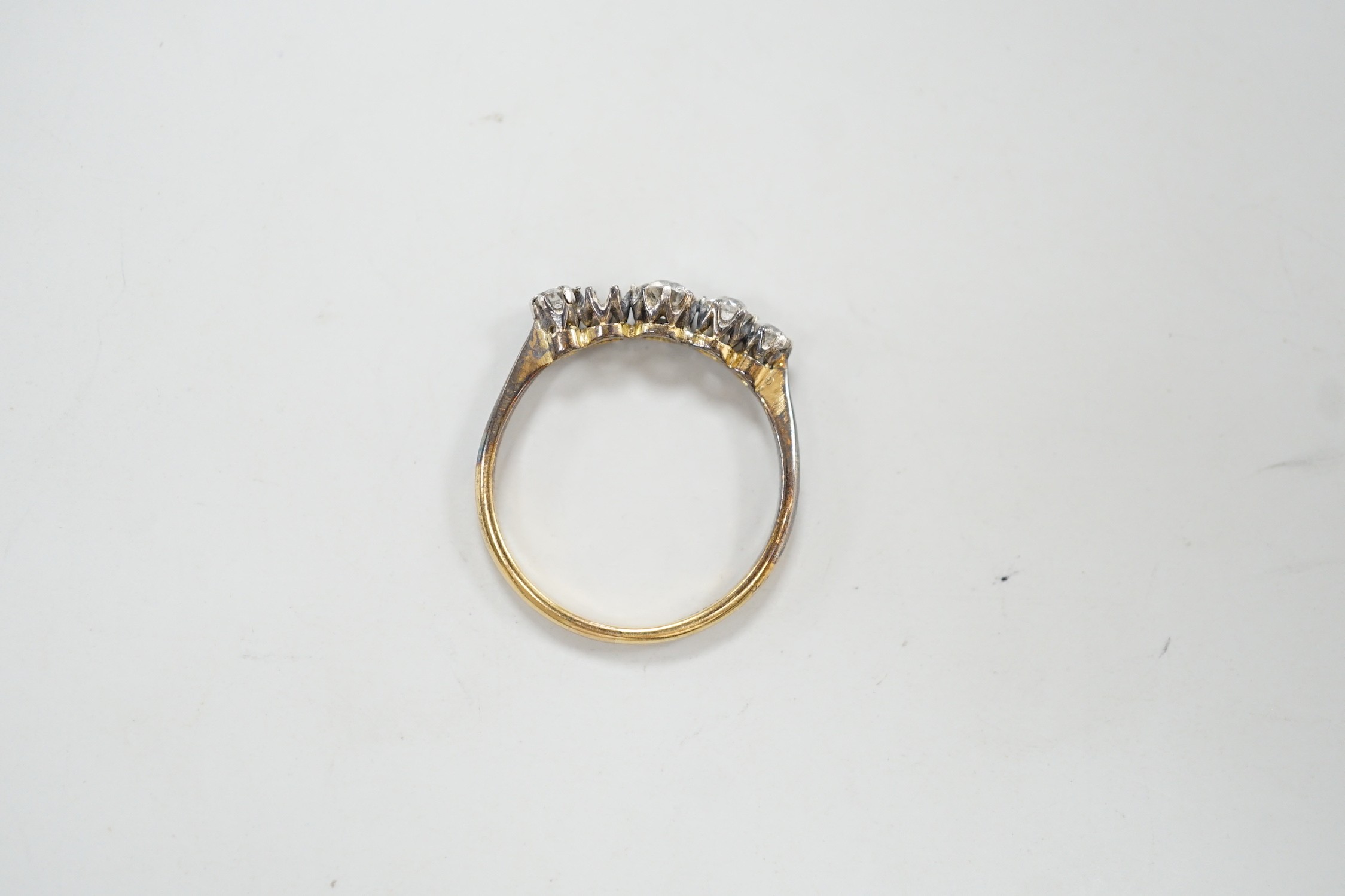 An 18ct and graduated five stone diamond set half hoop ring, size P, gross weight 1.9 grams, one - Image 4 of 4