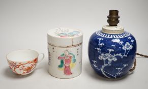 A 19th century Chinese famille rose cylindrical jar and cover, 11.5cm high, a blue and white