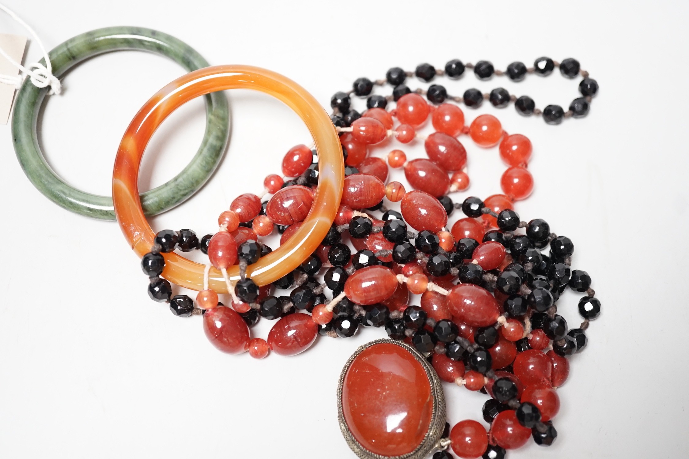 A spinach green Jade bangle and hardstone bead necklaces - Image 2 of 2