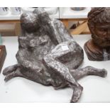 A large heavy cast metal abstract figure group, recumbent couple 67cm