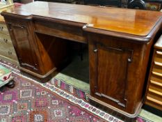 A Victorian mahogany inverse breakfront sideboard, length 180cm, depth 62cm, height 93cm