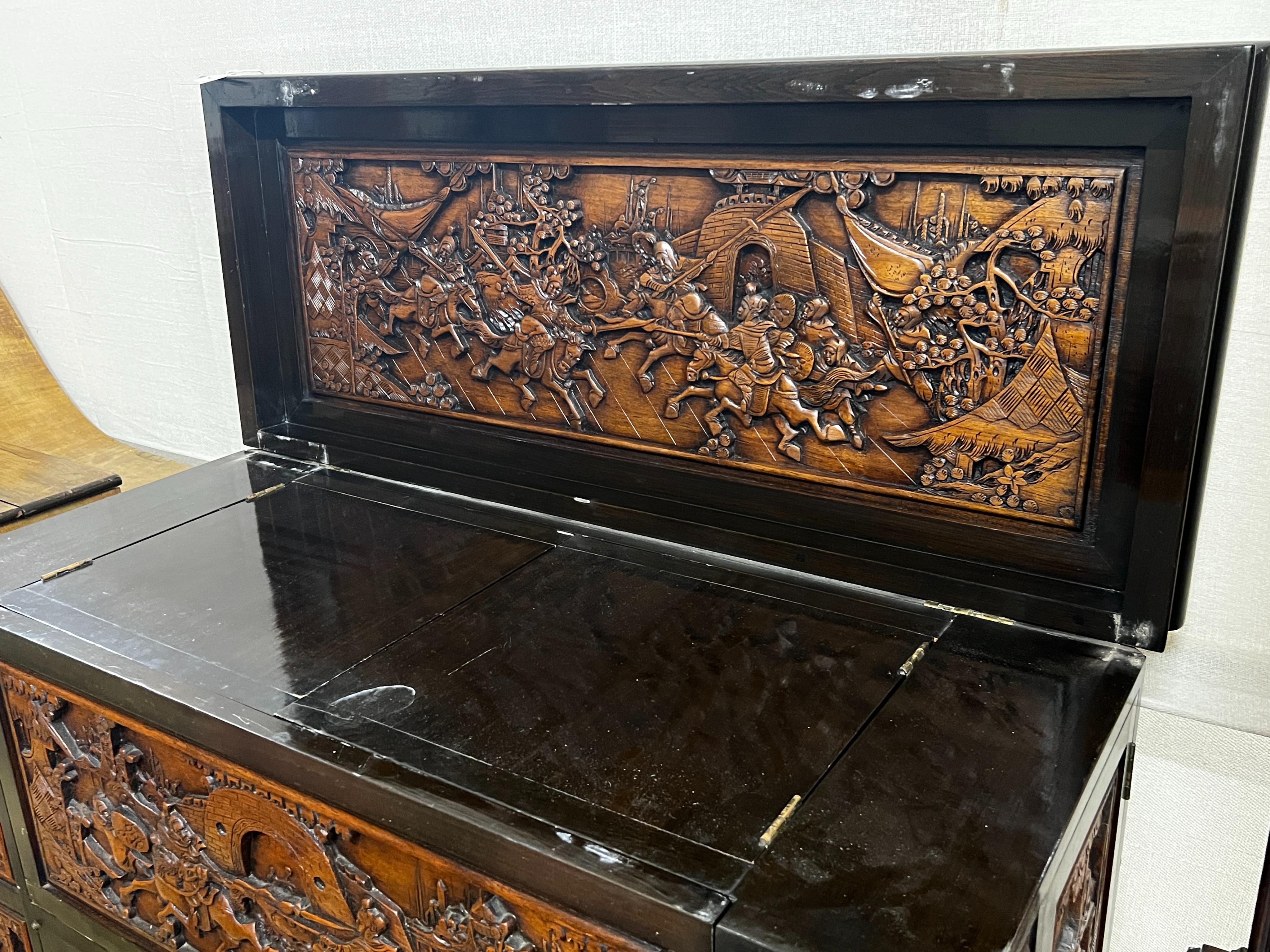 A Chinese carved hinged top cocktail cabinet with mirrored interior, width 111cm, depth 46cm, height - Image 9 of 9