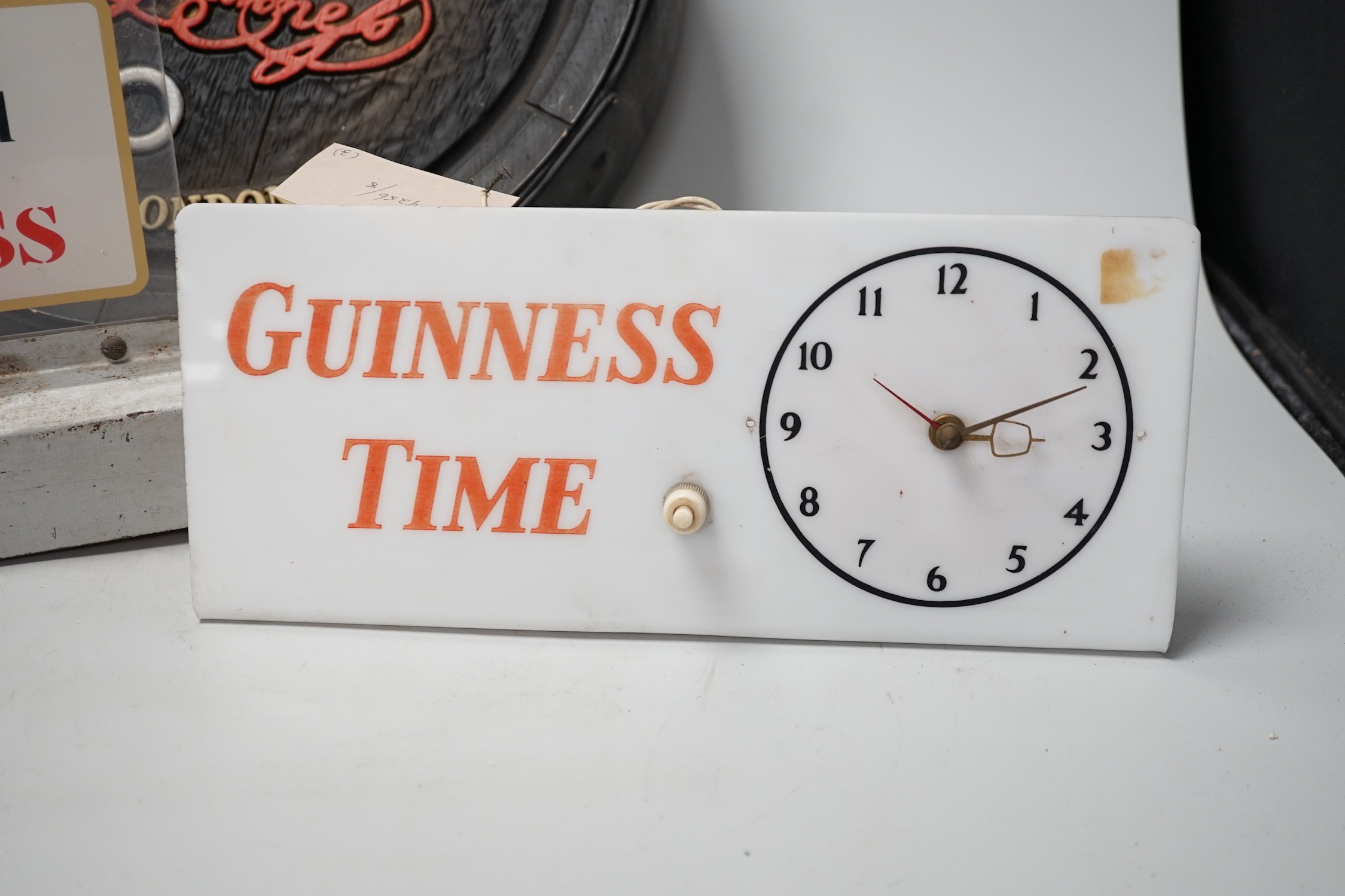 A Guinness time illuminating timepiece, Guinness display light and a Guinness advertising barrel - Image 2 of 4