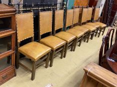 A set of eight 18th century style beech dining chairs