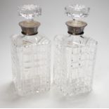 A pair of 20th century silver collared glass decanters and stoppers by Roberts & Dore Ltd, 24cm