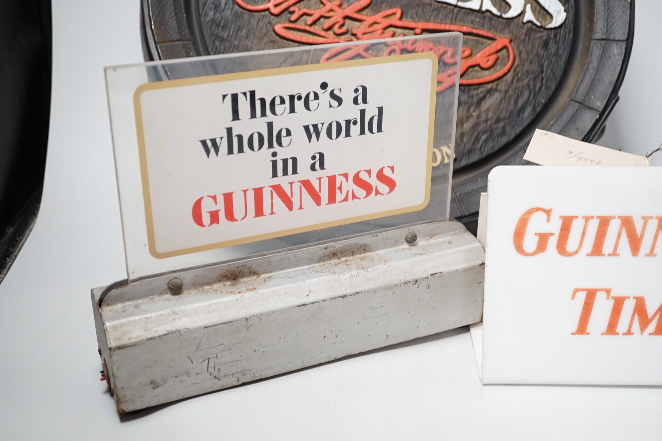 A Guinness time illuminating timepiece, Guinness display light and a Guinness advertising barrel - Image 3 of 4