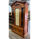 A Victorian satin birch wardrobe with bevelled glass front, length 124cm, depth 51cm, height