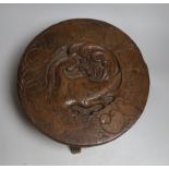 A South East Asian circular carved wooden stool, 36cms diameter