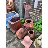 Six assorted terracotta and earthenware planters and ornaments *Please note the sale commences at