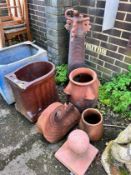 Six assorted terracotta and earthenware planters and ornaments *Please note the sale commences at