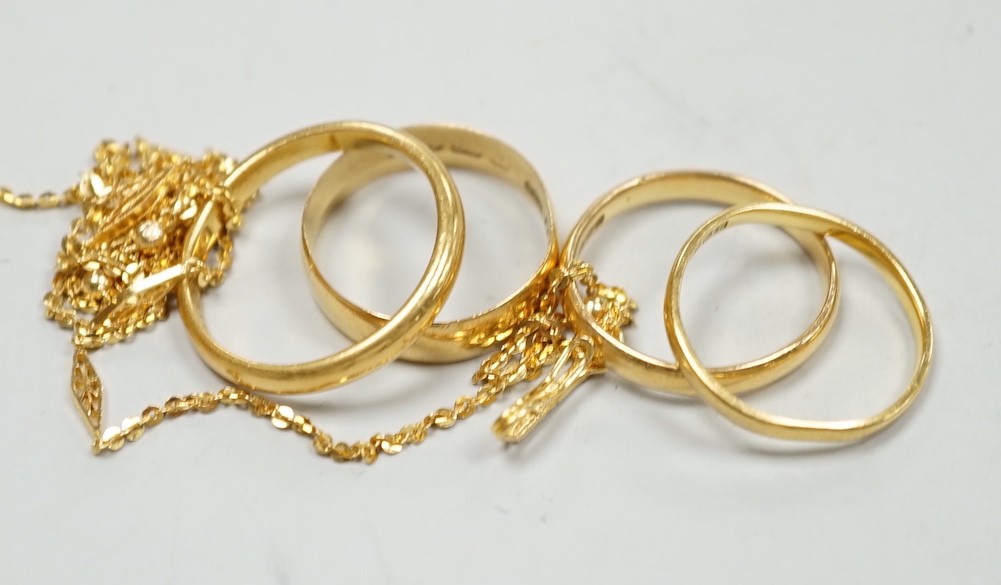 Four assorted 22ct gold wedding bands, including Birmingham, 1913, size P/Q and a 22k fine link