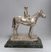A Elkington & Co. silver plated model of a horse and jockey, on marble base, 34cms high