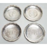 Three Hong Kong white metal mounted Republic of China coin dishes and a similar One Dollar 1930