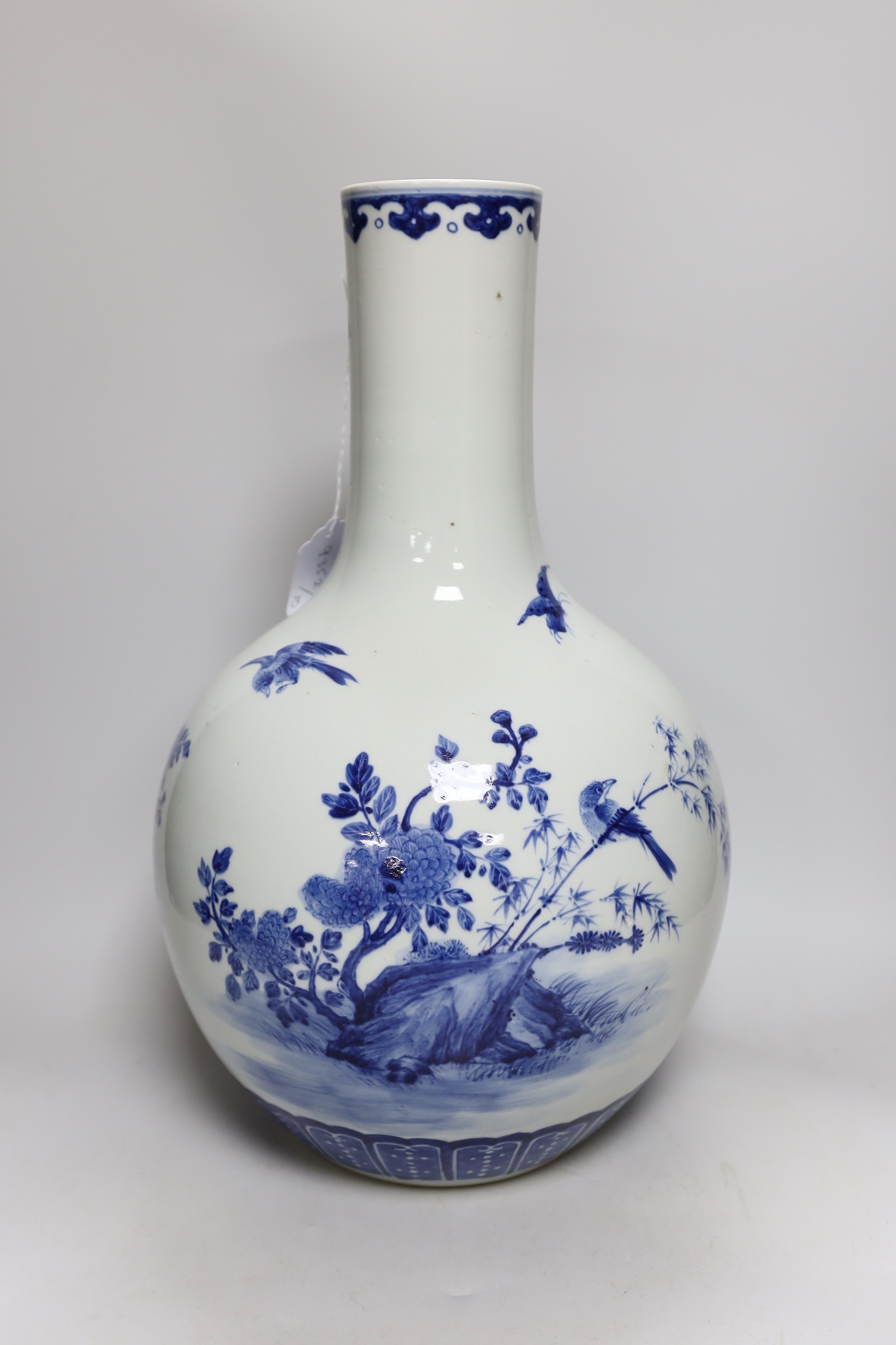 A large Chinese blue and white bottle vase, 46cms high - Image 2 of 2
