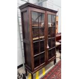 A George III mahogany glazed two door bookcase, width 112cm, depth 38cm, height 188cm*Please note