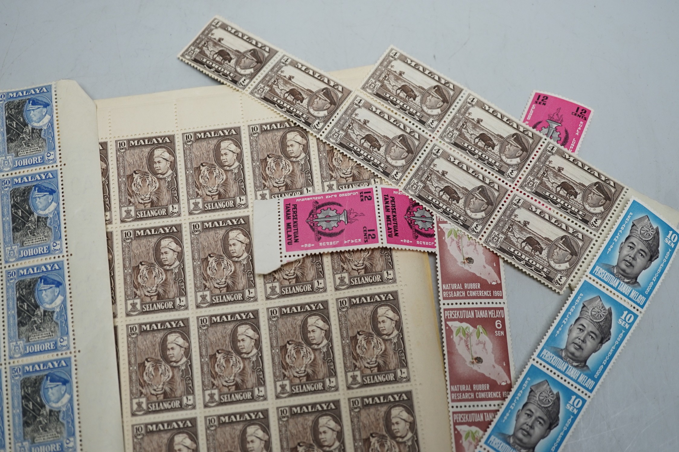 A group of World stamps in pockets including Malaya sheets - Image 2 of 2