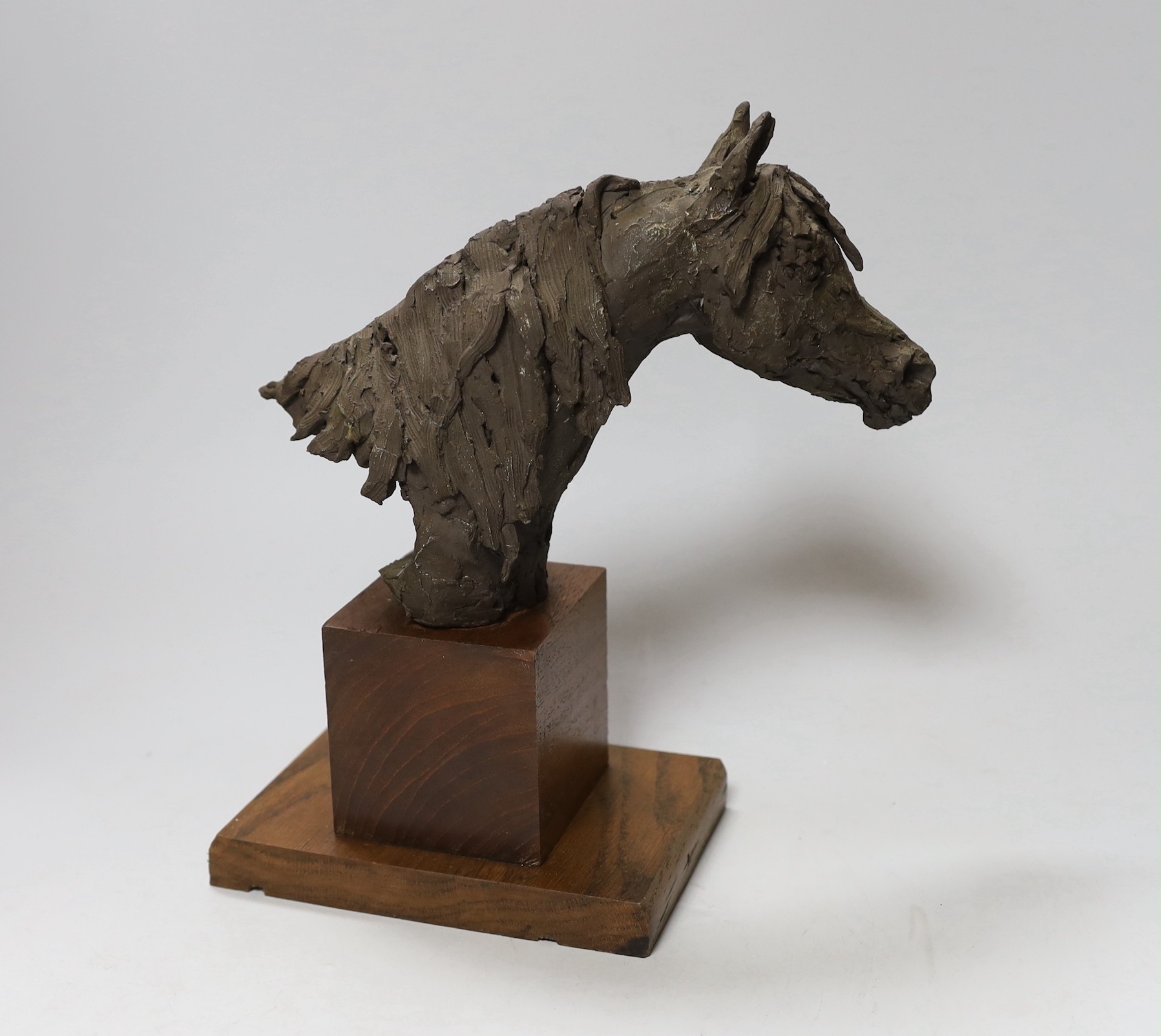 A resin horse head on wooden stand, 26cms high - Image 2 of 2