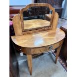 An Art Deco walnut D shaped dressing table, width 100cm, depth 45cm, height 122cm *Please note the